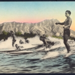 Sunny Scenes HA-14 "Surf-boat Riding on the long-running waves from out beyond the coral reef at Waikiki", unused