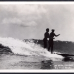 Real Photo "A fast slide, tandem surfriding. / By Tom Blake (Copyright)"